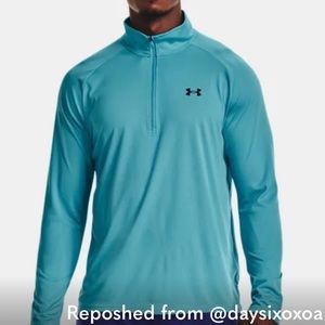Under Armour Men’s 1/2 zip long sleeve shirt.  Large, rich turquoise color
